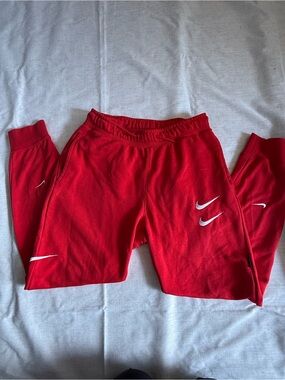 Nike Red Kids' Sweatpants with White Swooshes